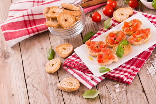 istock Friselle with cherry tomatoes and basil. 1469782053