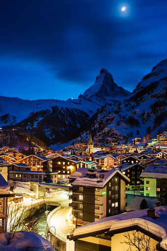 World famous Zermatt town with Matterhorn peak in Mattertal, Valais canton, Switzerland, at dusk in winter. Taken by Sony a7R II, 42 Mpix.