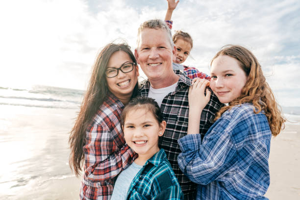 istock Family on the beach 1469785018