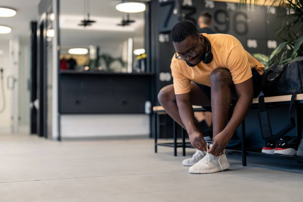 istock Handsome sportsman getting ready for training session in gym 1469785943