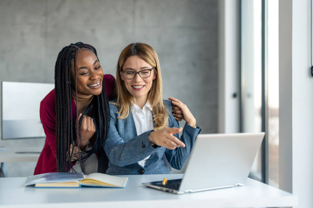 istock Successful business women working together on laptop 1469788626