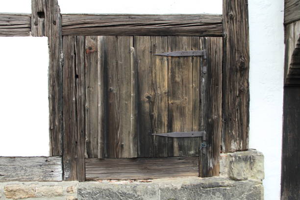 Old Faded Red Door On Abandoned And Falling Apart Church -- HDR
