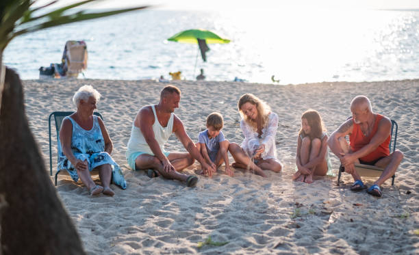 istock Happy piglets gathered on the beach. 1469791114