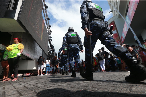 salvador, bahia, brazil - february 20, 2023: municipal guard officers working at the 2023 carnival circuit in the city of salvador.