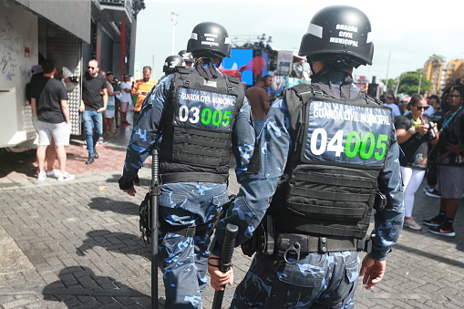 salvador, bahia, brazil - february 20, 2023: municipal guard officers working at the 2023 carnival circuit in the city of salvador.