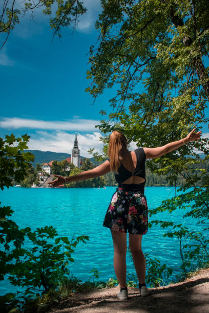 istock Young blonde girl enjoying Lake Bled (Slovenia) 1469792365