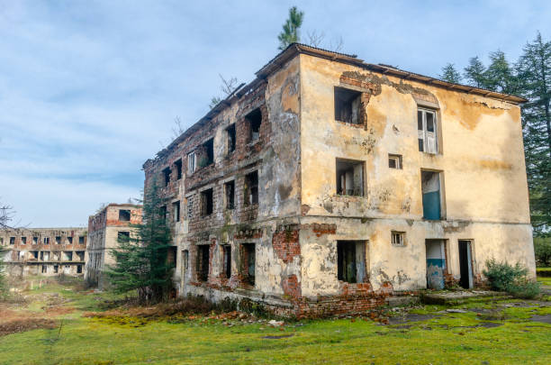 istock old abandoned three-story crumbling building 1469793000