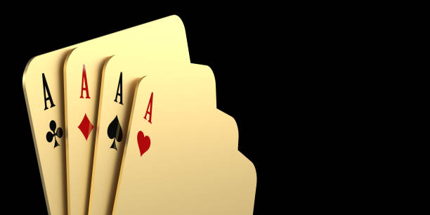 Four Aces winning poker hand on black stock photo