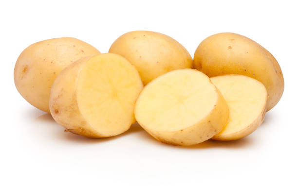 istock Raw potatoes cut in slices isolated on white background 1469795412