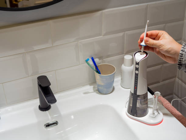 istock domestic dental water flosser 1469798124