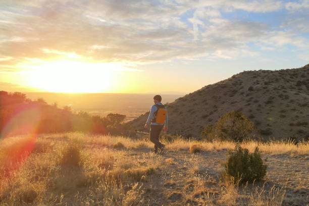 istock hiking middle aged man majestic mountain sunset 1469799776