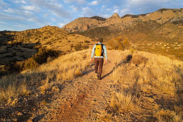 istock hiking middle aged man majestic mountain sunset 1469799779