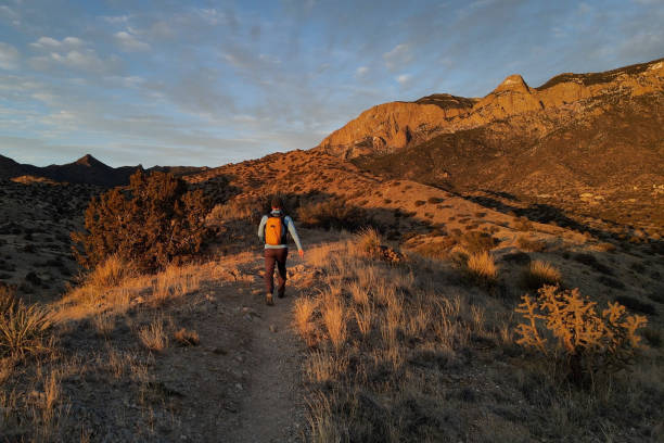 istock hiking middle aged man majestic mountain sunset 1469799820