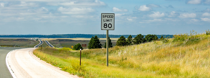 Speed limit 80 MPH sign on interstate 90 in Wyoming, panorama