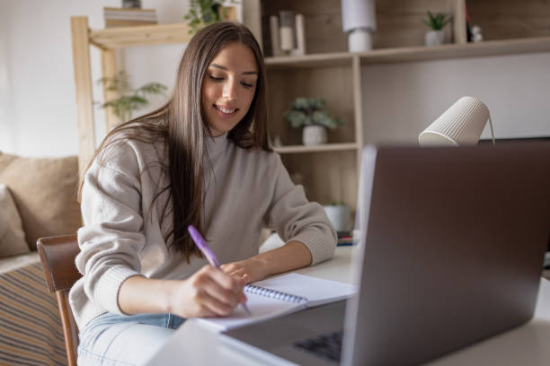 istock Young beautiful woman working from home office 1469802402