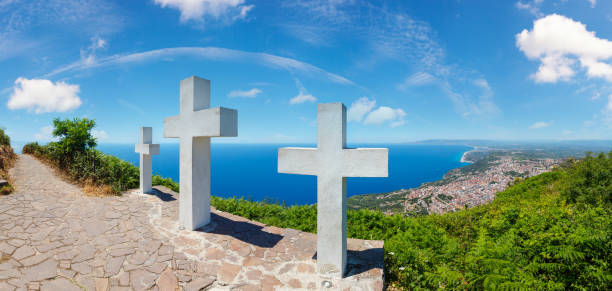 Summer picturesque Tyrrhenian sea Calabrian coast view from Monte Sant'Elia (Saint Elia mount, Calabria, Italy) top. Three Christianity crosses on mountain top.