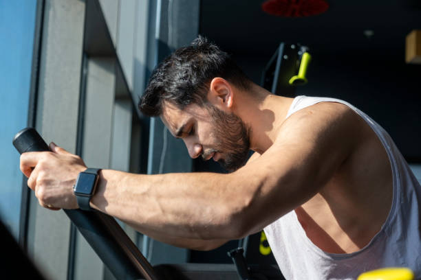 istock Young man doing cardio training in the gym 1469803272