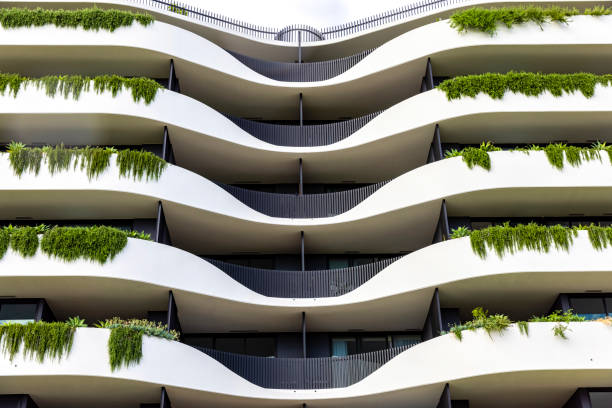 istock New, modern apartment building with vertical gardens, front view, copy space 1469803854