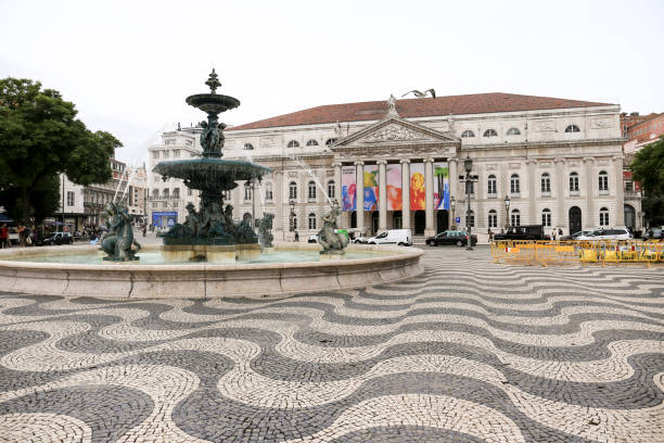 Lisbon, Portugal- November 21, 2022: The Rossio Square in Lisbon on a cloudy day of winter