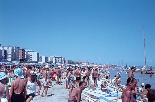 Crowd of tourists on the Grande Plage, the main beach of Saint-Jean-de-Luz, France