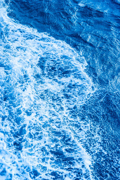 istock Aerial Ocean Blue Water White Foam Vertical 1469810962