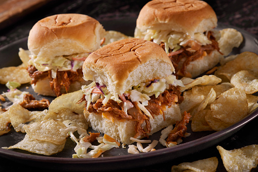Pulled Pork Sliders on Hawaiian Buns with Coleslaw and Potato Chips