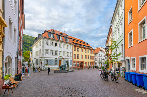 Murau, Austria - August 2020: Centre of the town of Murauin state of Steiermark, Austria. Traditional central european buildings in light colors are surrounding the square.