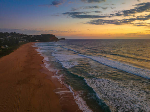 istock Sunrise at the seaside with clouds 1469828812