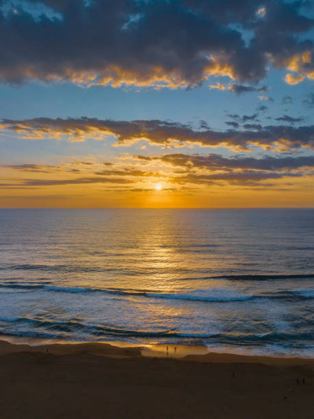 istock Sunrise at the seaside with clouds 1469828856