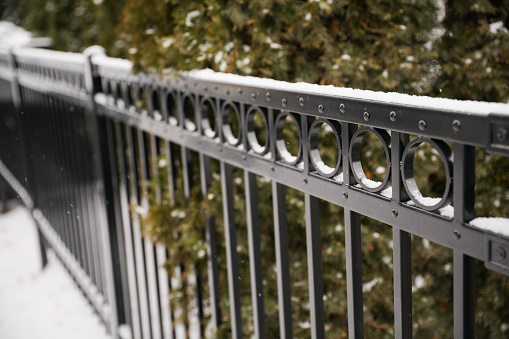 snow fall in the city fences metal pattern handrail