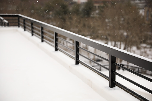 snow fall in the city fences metal pattern handrail