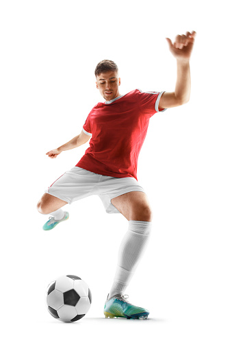 Leader. Close up legs of professional soccer, football player fighting for ball on field isolated on white background. Concept of action, motion, high tensioned emotion during game. Cropped image.