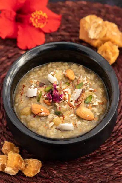 Photo of Gur Ki Kheer Also Called Jaggery Rice Pudding, Nolen Gurer Payesh, Rasiyav, Gud Wali Chawal Ki Khir, Rasiya, Ras Bakheer, Rasiyaw, Payasam Made Of Basmati Rice, Milk, Sugar, Jaggery, Gulab JalIn, Ghee