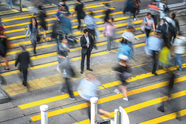 istock Blurred Businesspeople On Their Way To Work 1469850271