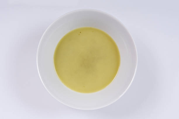 Healthy spinach soup on a white background