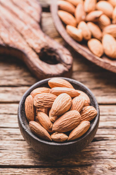 istock pile of natural almonds (Prunus dulcis) close-up image 1469853323