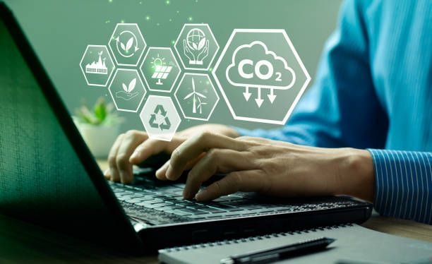istock CO2 emission reduction concept, businessman with environmental technology Icons, global warming, sustainable development, renewable energy business. climate change, carbon capture, storage, reuse 1469867380