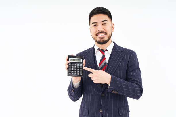 istock A man in a suit with a calculator 1469878497