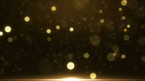 istock Gold lights rays stage scene for award winning event, abstract particle glitter 1469886736
