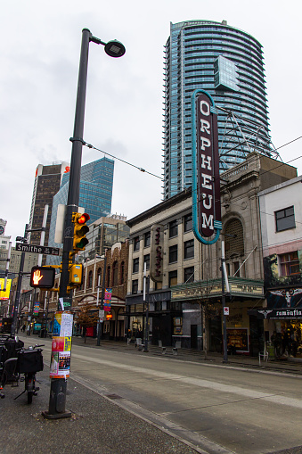 Vancouver, CANADA - Jan 31 2022 : Granville Street in Downtown Vancouver in cloudy day.