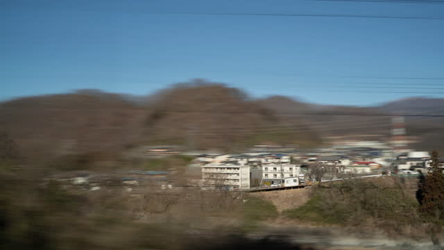 Abstract time-lapse view from the Shinkansen, the bullet train, to Kawaguchiko, Japan