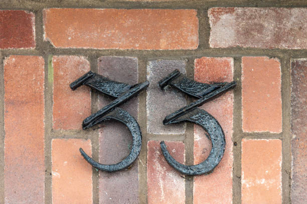 istock Metal number on brick wall 1469900361