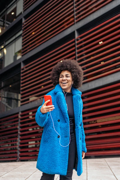 istock Cheerful Afro Girl 1469901549