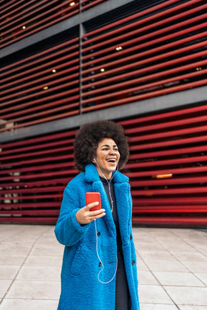 istock Cheerful Afro Girl 1469901550