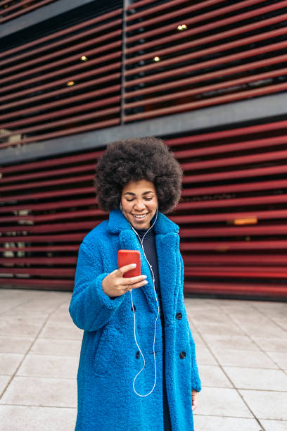 istock Cheerful Afro Girl 1469901561