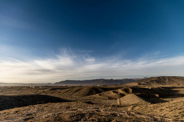 Arid land in the mountains, empty space, clouds with blue sky, Quetta Valley