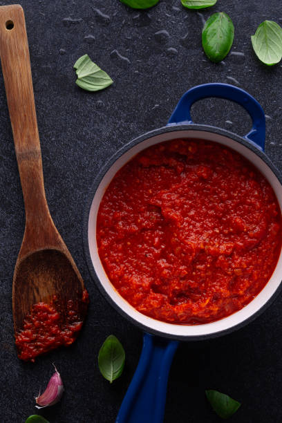 istock Marinara Sauce in Blue Cooking Pot 1469908302
