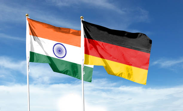 istock German flag with Indian flag on cloudy sky. waving in the sky 1469908492