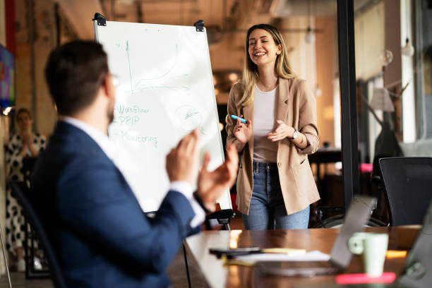 istock Businessman present his idea to working team 1469910418