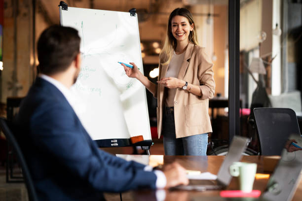 istock Businessman present his idea to working team 1469910430